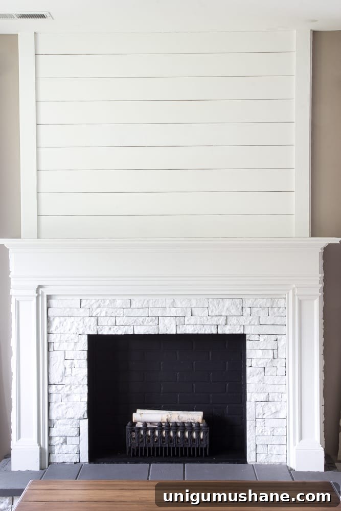 Modern DIY Faux Fireplace Makeover 13 DIY Faux Fireplace Updated | blesserhouse.com - This fireplace looks so real and it cost about $600 to build!