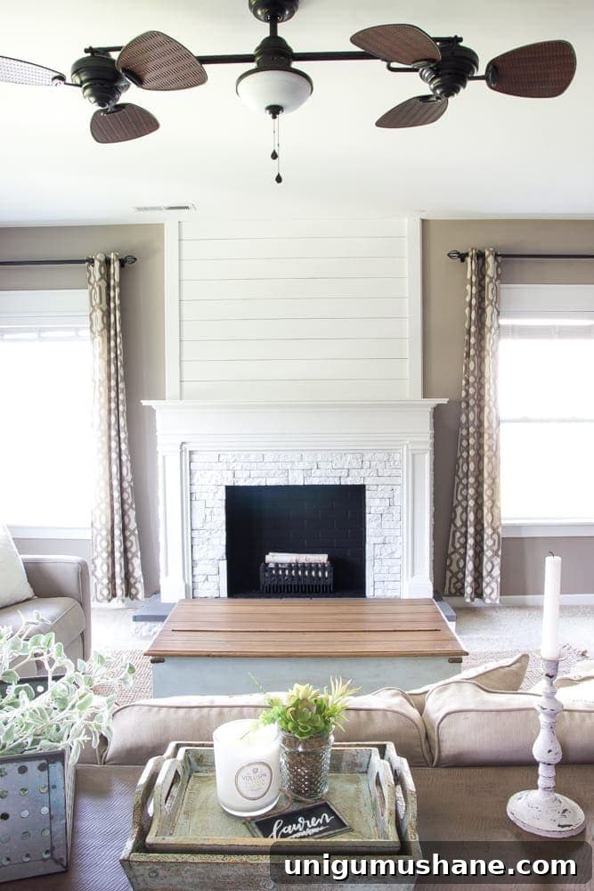 Modern DIY Faux Fireplace Makeover 15 DIY Faux Fireplace Updated | blesserhouse.com - This fireplace looks so real and it cost about $600 to build!