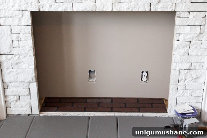 Modern DIY Faux Fireplace Makeover 7 DIY Faux Fireplace Updated | blesserhouse.com - This fireplace looks so real and it cost about $600 to build!