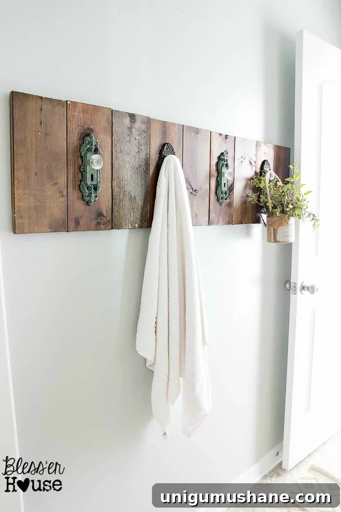 18 Affordable DIY Wall Decor Ideas to Transform Any Room 15 towel hooks made from old wood scraps and door knobs