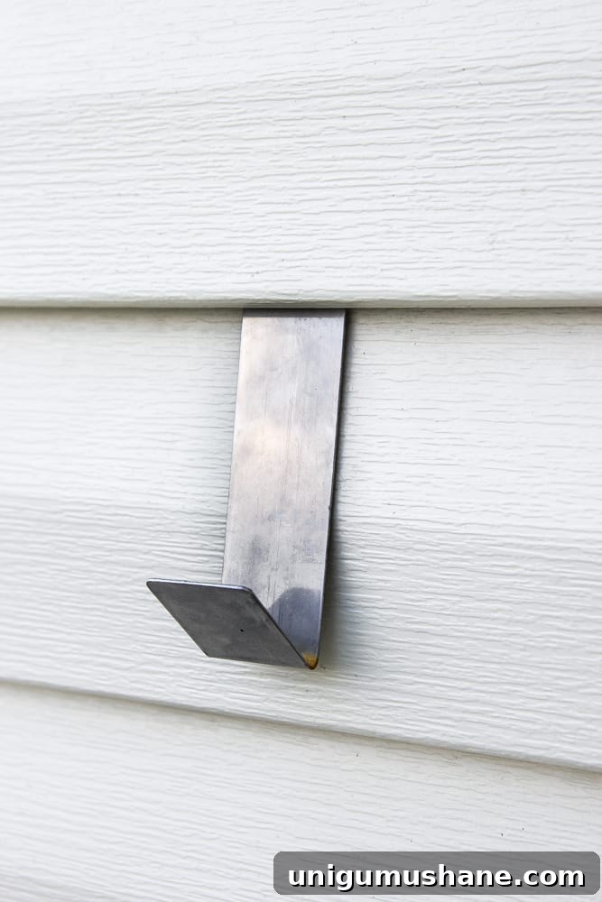 Hanging trough boxes on siding