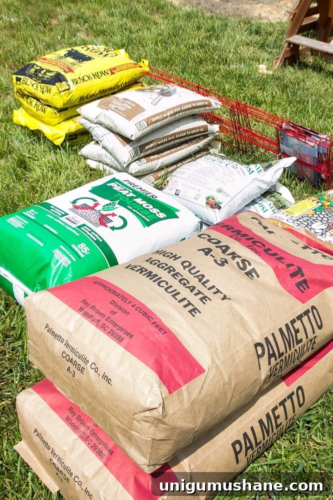 How to Grow a High Yield Raised Bed Vegetable Garden 5 stacks of vegetable gardening soil, peat moss, vermiculite, and compost bags