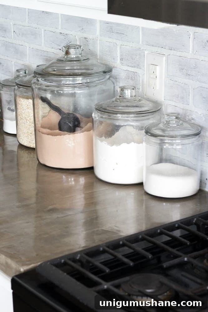 Concrete Countertops: Pros, Cons, and Common Problems 7 Grease stains on concrete countertop near stove