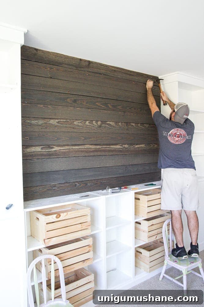 DIY Wood Plank Accent Wall One Room Challenge Week 4 7 DIY Reclaimed Wood Plank Focal Wall | blesserhouse.com - How to install a reclaimed wood plank focal wall in under an hour to create contrast, texture, and character in any space.