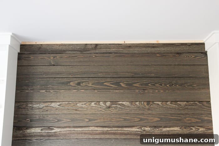 DIY Wood Plank Accent Wall One Room Challenge Week 4 8 DIY Reclaimed Wood Plank Focal Wall | blesserhouse.com - How to install a reclaimed wood plank focal wall in under an hour to create contrast, texture, and character in any space.