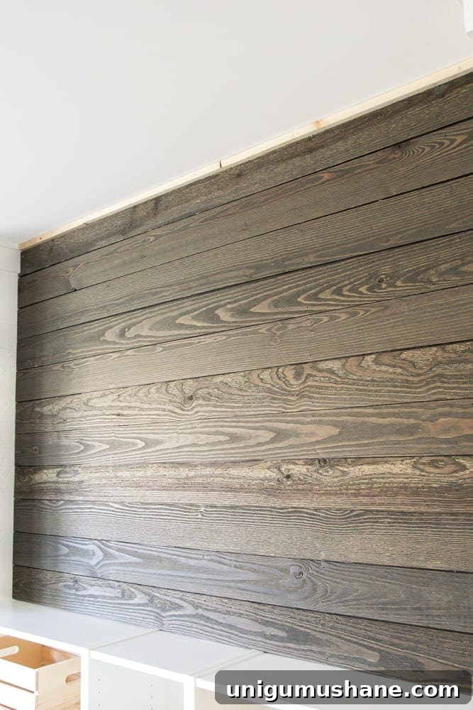 DIY Wood Plank Accent Wall One Room Challenge Week 4 9 DIY Reclaimed Wood Plank Focal Wall | blesserhouse.com - How to install a reclaimed wood plank focal wall in under an hour to create contrast, texture, and character in any space.