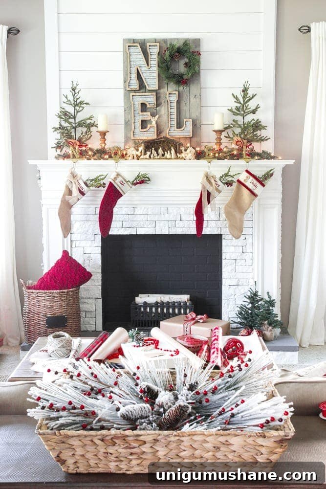 Cozy Christmas Living Room Tour with Holiday Decor Ideas 6 Christmas mantel with farmhouse stockings, greenery, baskets, candles, and rustic holiday decor.