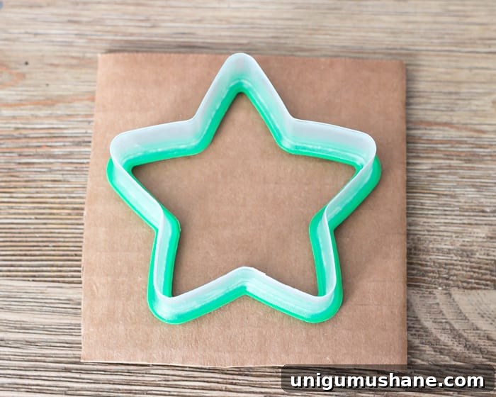 How to Make Nordic Sweater Mini Christmas Trees 10 DIY Nordic Sweater Mini Christmas Trees | blesserhouse.com - How to make Nordic sweater mini Christmas trees using just florist foam, ribbon, and hot glue for cute decor accents on tabletops and mantels.