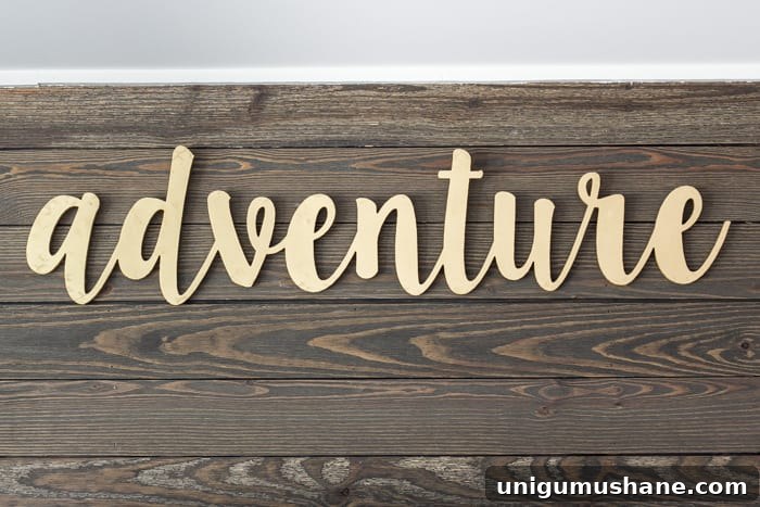 One Room Challenge Week 6: Eclectic Farmhouse Playroom Reveal 7 Adventure sign above TV