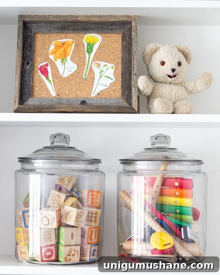 One Room Challenge Week 6: Eclectic Farmhouse Playroom Reveal 10 Hocking jars with toys on shelves