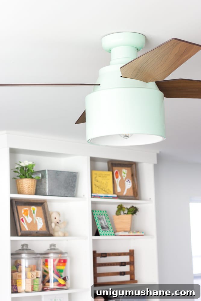 One Room Challenge Week 6: Eclectic Farmhouse Playroom Reveal 17 Mint ceiling fan in playroom