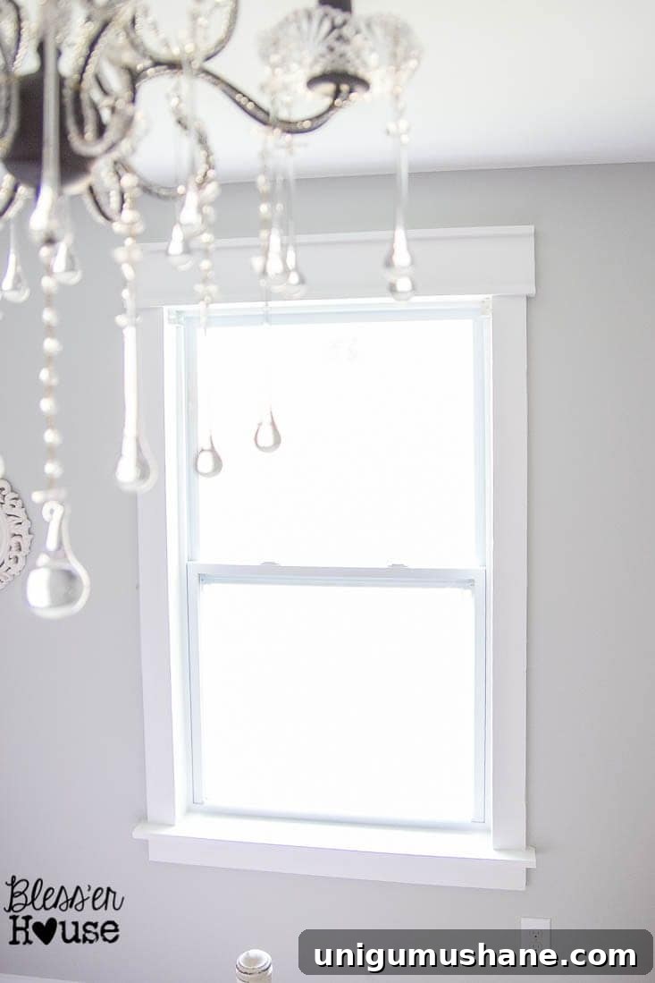 18 Ways to Add Farmhouse Charm to a Builder-Grade Home 4 Dressed window with curtains