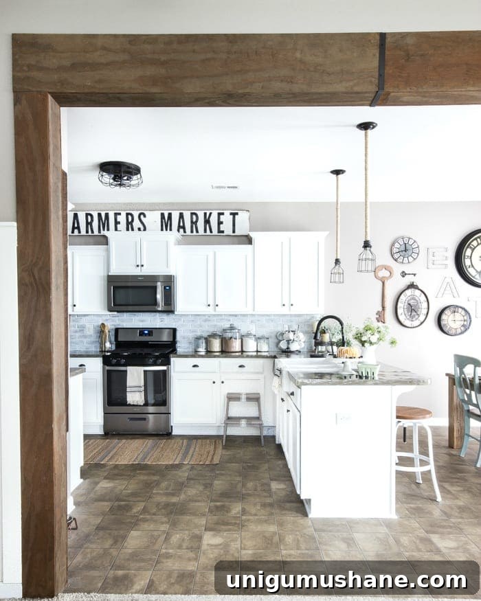 18 Ways to Add Farmhouse Charm to a Builder-Grade Home 5 Doorway wrapped in wood beam