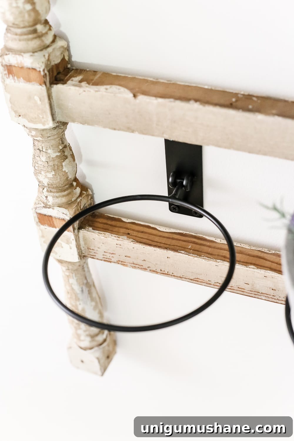 Antique Banister Wall Planter for Charming Staircase Decor 4 DIY Antique Banister Wall Planter | www.blesserhouse.com - A quick and simple tutorial for how to make a wall planter from a repurposed antique banister using artificial plants. Cute way to bring the outdoors in!
