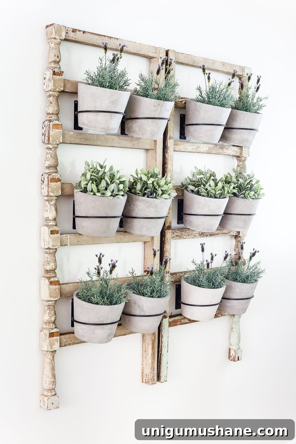 Antique Banister Wall Planter for Charming Staircase Decor 6 DIY Antique Banister Wall Planter | www.blesserhouse.com - A quick and simple tutorial for how to make a wall planter from a repurposed antique banister using artificial plants. Cute way to bring the outdoors in!