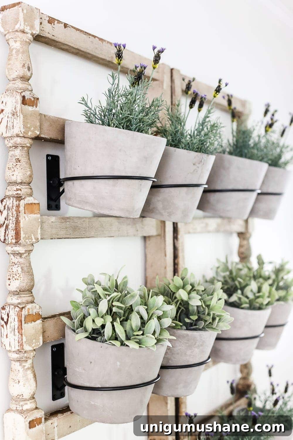 Antique Banister Wall Planter for Charming Staircase Decor 7 DIY Antique Banister Wall Planter | www.blesserhouse.com - A quick and simple tutorial for how to make a wall planter from a repurposed antique banister using artificial plants. Cute way to bring the outdoors in!