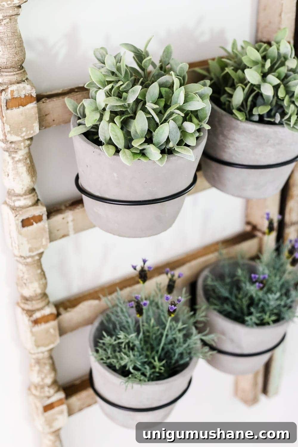 Antique Banister Wall Planter for Charming Staircase Decor 8 DIY Antique Banister Wall Planter | www.blesserhouse.com - A quick and simple tutorial for how to make a wall planter from a repurposed antique banister using artificial plants. Cute way to bring the outdoors in!