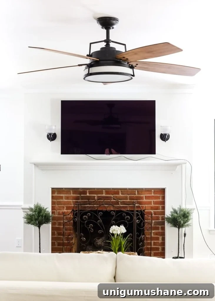 How to Replace a Ceiling Fan in Your Living Room 3 Living Room Update: Ceiling Fan Swap | blesserhouse.com - A bland, boring living room gets a makeover with a modern industrial farmhouse style ceiling fan - Casablanca Caneel Bay.