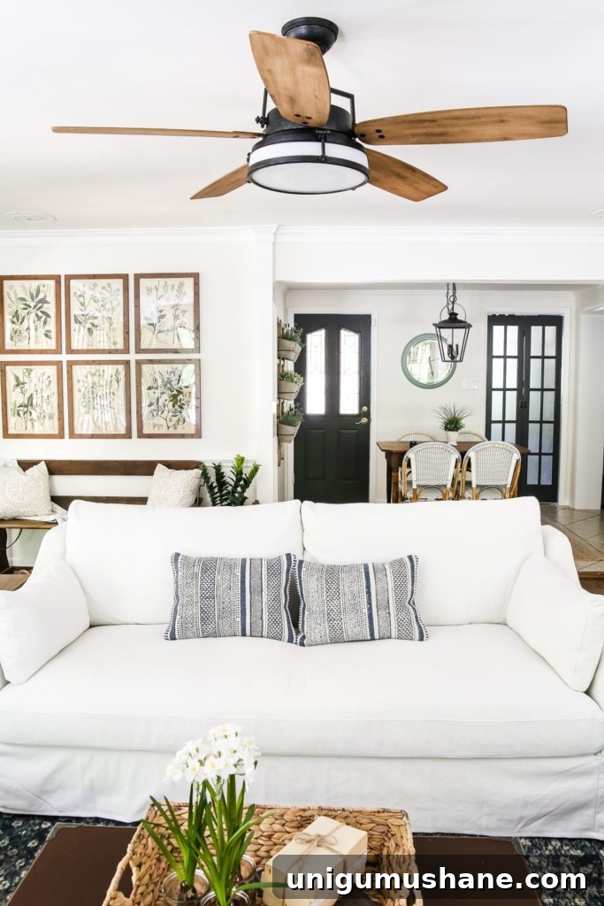 How to Replace a Ceiling Fan in Your Living Room 6 Living Room Update: Ceiling Fan Swap | blesserhouse.com - A bland, boring living room gets a makeover with a modern industrial farmhouse style ceiling fan - Casablanca Caneel Bay.
