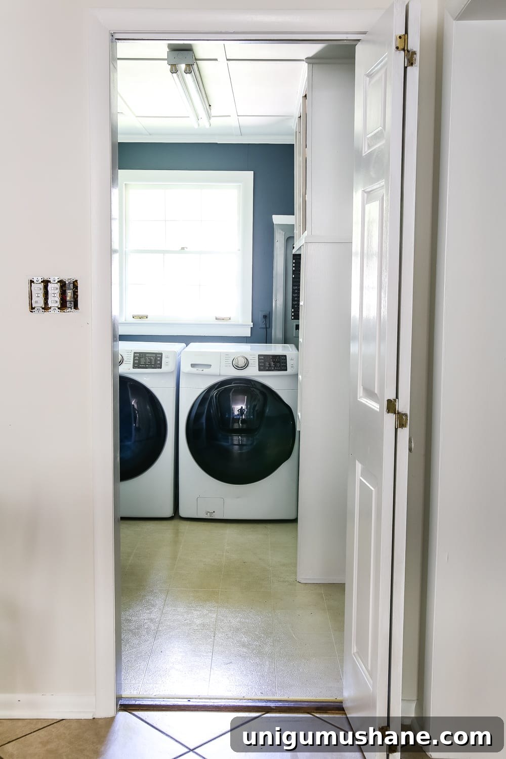 Transform Your Laundry Room with a French Bifold Door 2 Laundry Room Updates: French Bifold Door | blesserhouse.com - A rickity laundry room bifold door gets a beautiful and functional update with a French bifold door with frosted glass for hiding messes in a stylish way.