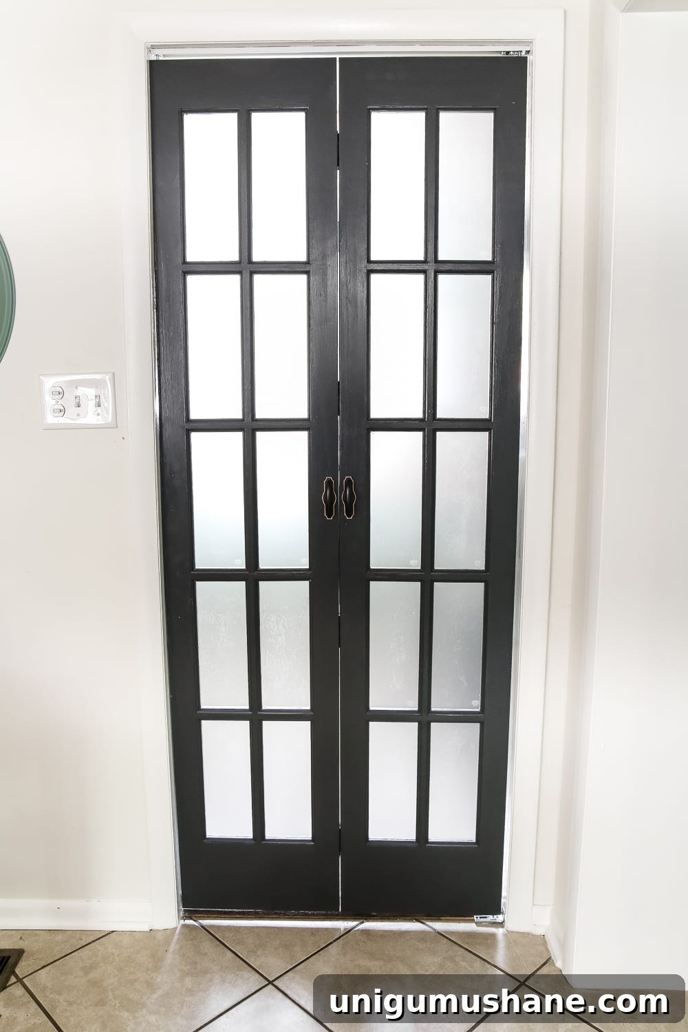 Transform Your Laundry Room with a French Bifold Door 5 Laundry Room Updates: French Bifold Door | blesserhouse.com - A rickity laundry room bifold door gets a beautiful and functional update with a French bifold door with frosted glass for hiding messes in a stylish way.