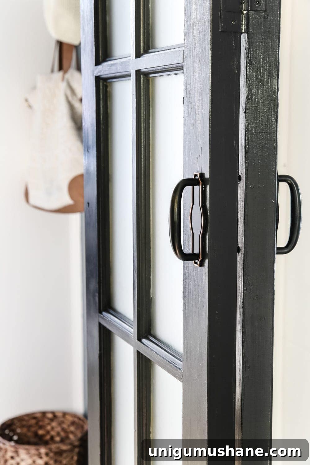 Transform Your Laundry Room with a French Bifold Door 6 Laundry Room Updates: French Bifold Door | blesserhouse.com - A rickity laundry room bifold door gets a beautiful and functional update with a French bifold door with frosted glass for hiding messes in a stylish way.
