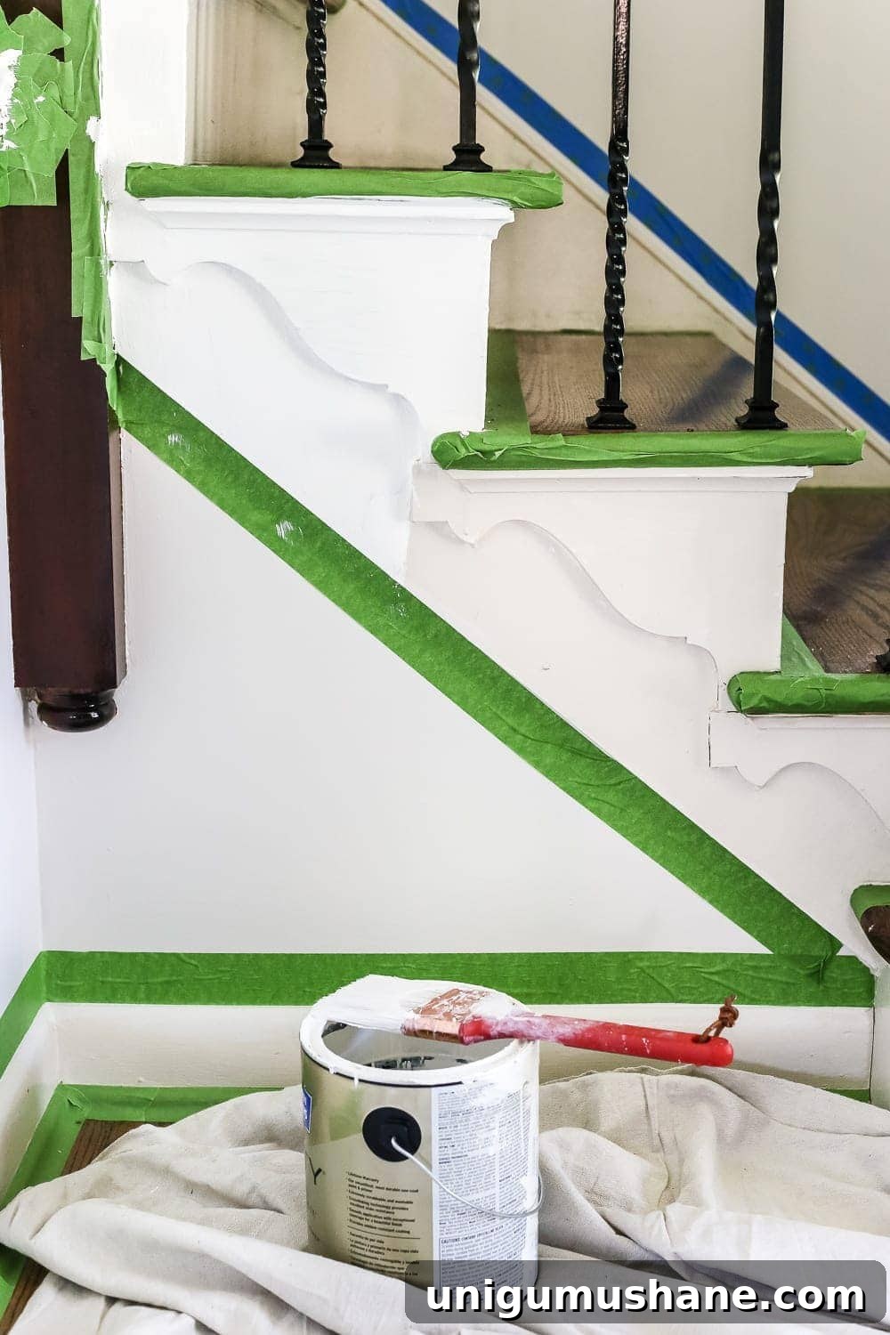 Neutral Paint Ideas to Update Your Foyer 4 Neutral Painted Foyer Update | Blesserhouse.com - A drab, dated foyer and staircase get a bright, neutral facelift with high contrast details using Benjamin Moore colors Classic Gray and Wrought Iron.