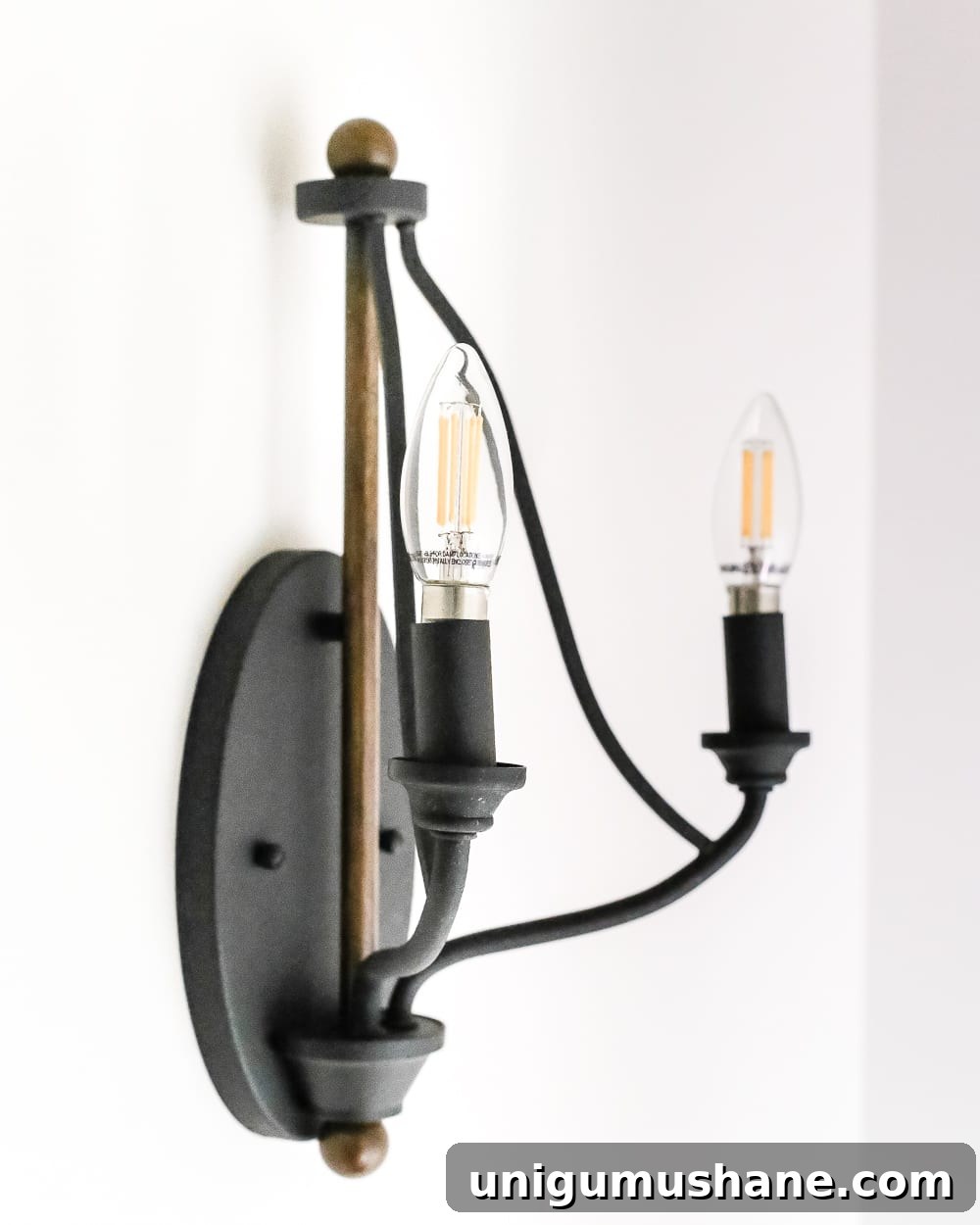 Neutral Paint Ideas to Update Your Foyer 8 Neutral Painted Foyer Update | Blesserhouse.com - A drab, dated foyer and staircase get a bright, neutral facelift with high contrast details using Benjamin Moore colors Classic Gray and Wrought Iron.