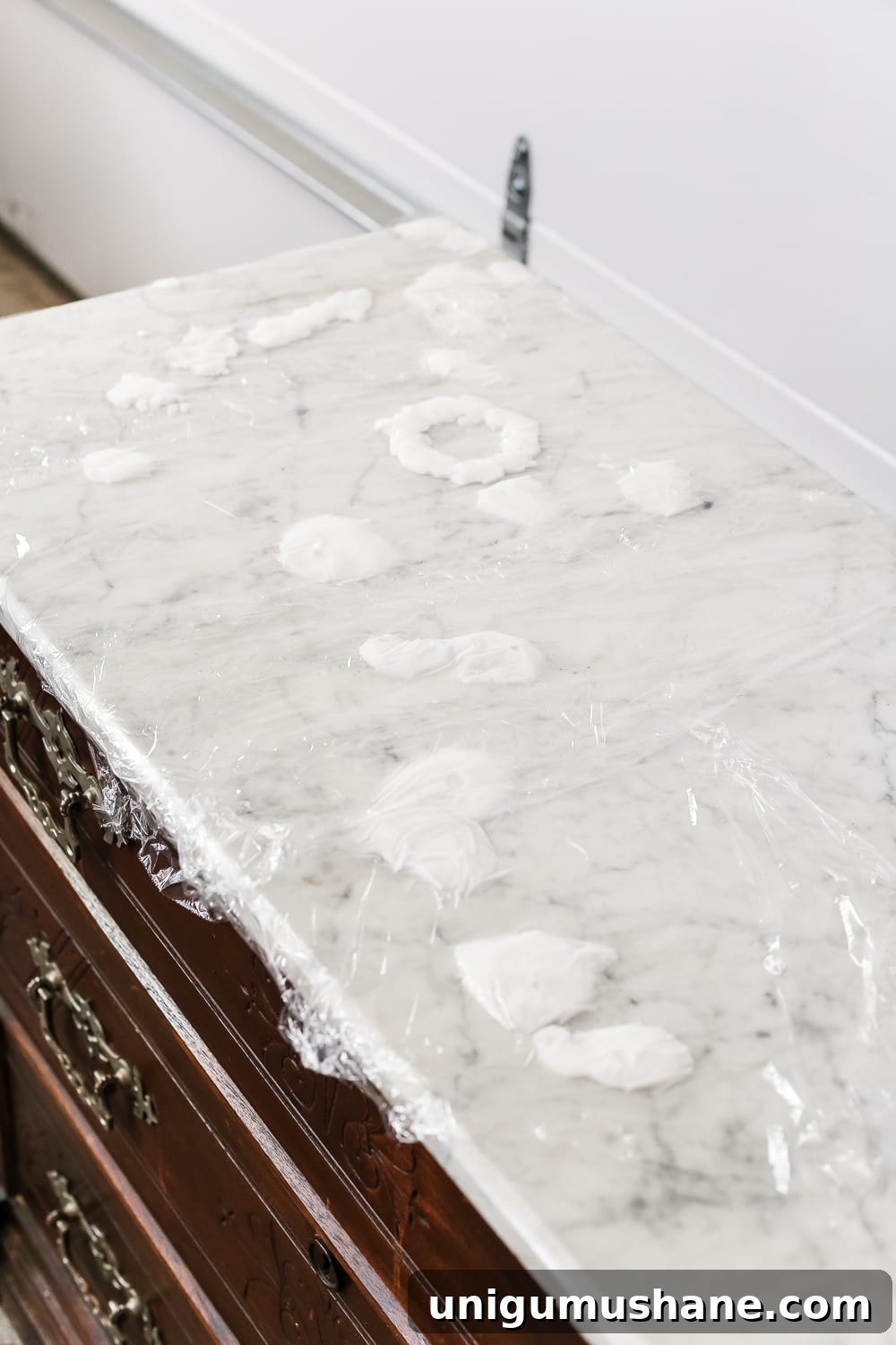 Marble Stain Removal and Foyer Chest Makeover 4 Applying baking soda paste to marble