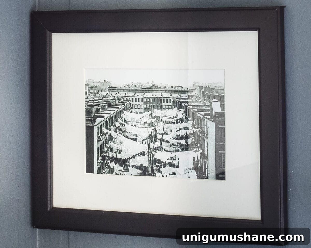 Vintage Clothesline Printable Wall Art for Laundry Room 8 Vintage Clothesline Laundry Room Art Printable Set | blesserhouse.com - A free downloadable printable set of 6 vintage black & white clothesline cityscape and countryscape photos perfect for framing in a laundry room.