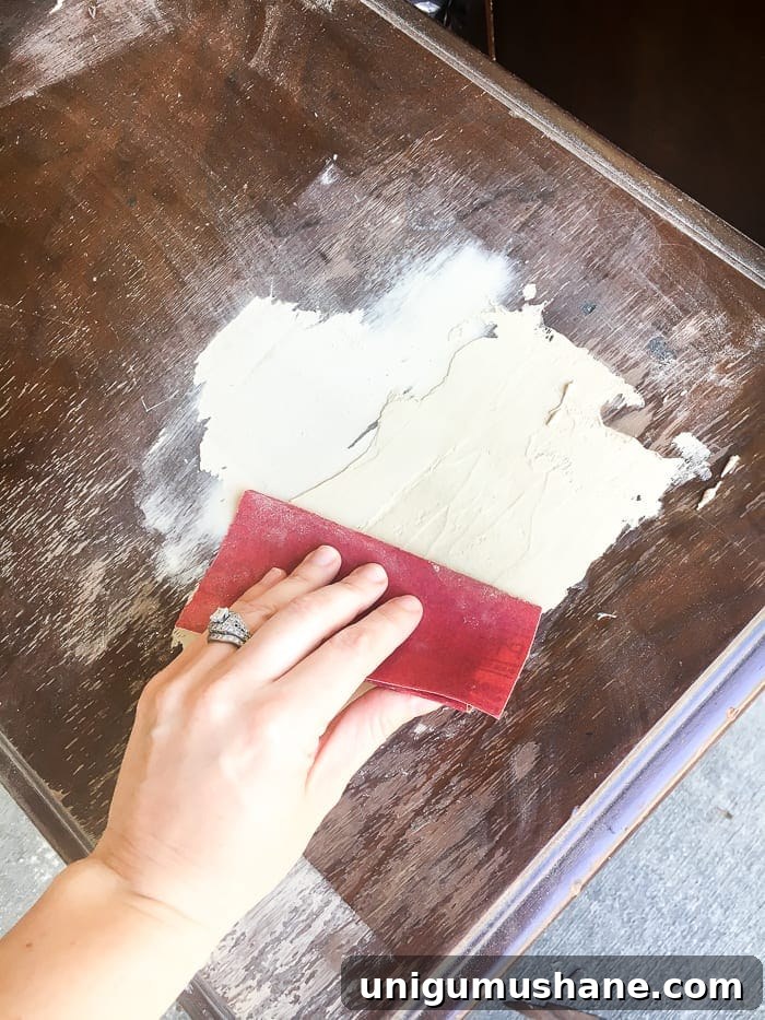 DIY Faux Gilded Nightstands with Gold Leaf Finish 6 Faux Gilded Nightstands | blesserhouse.com - A pair of old, broken wooden nightstands gets a bright white, French-inspired facelift with a faux gilded bronze finish.