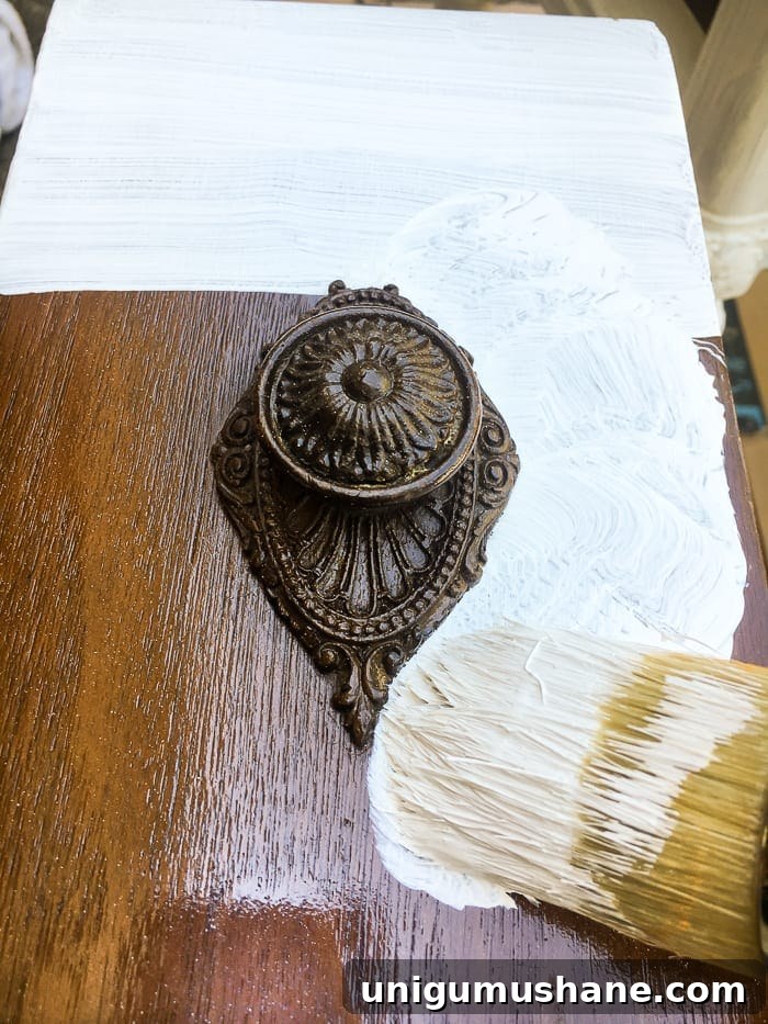 DIY Faux Gilded Nightstands with Gold Leaf Finish 7 Faux Gilded Nightstands | blesserhouse.com - A pair of old, broken wooden nightstands gets a bright white, French-inspired facelift with a faux gilded bronze finish.