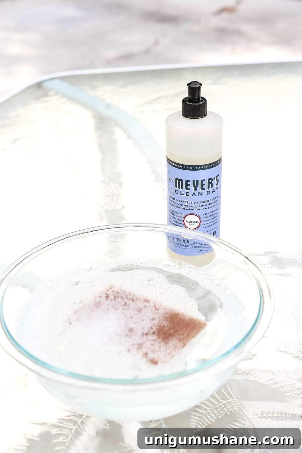 Deep Clean a Glass Patio Dining Table Without Streaks 5 How to Revive a Glass Patio Table | blesserhouse.com - A tutorial explaining how to clean, paint, and revive a glass patio table to make it look brand new in a few quick steps.
