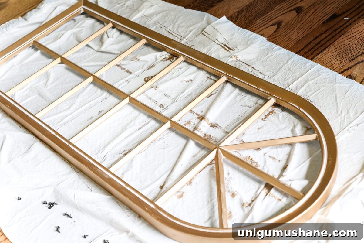 Create an Aged Gold Antique Mirror Finish 5 DIY Aged Gold Antique Mirror Makeover | blesserhouse.com - A DIY tutorial to transform a cheap, plastic mirror to look like an Anthropologie inspired aged gold antique mirror using Rub 'n Buff.