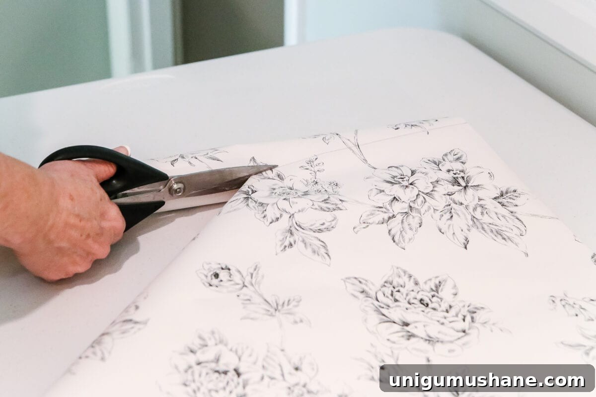 How to Hang Wallpaper: Step-by-Step for Perfect Results 3 Paper booked and ready to hang