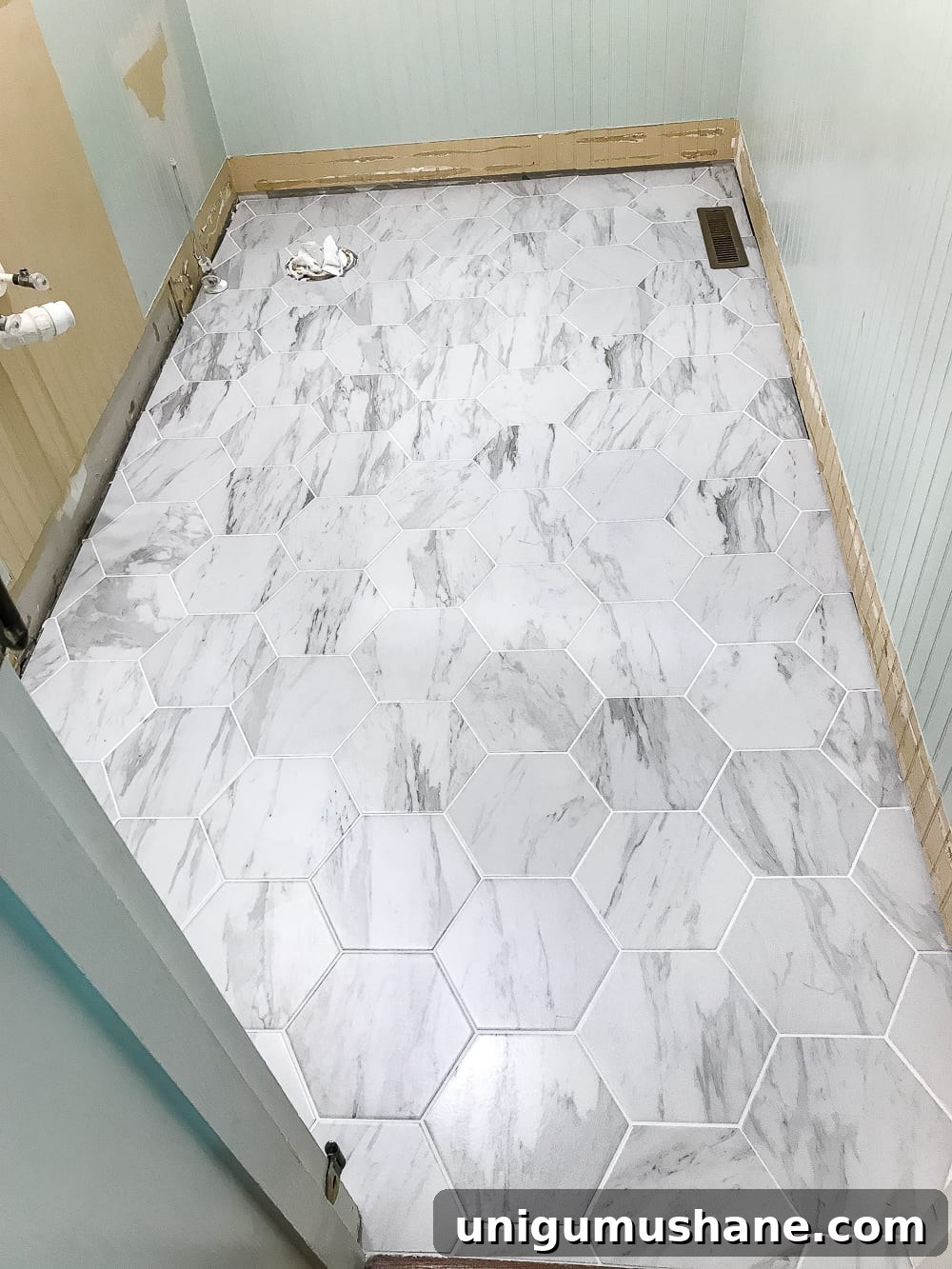 Transform Your Powder Room with Faux Marble Tile Flooring 7 The Best Faux Marble Tile | blesserhouse.com - A dated powder room floor gets a modern classic refresh with faux marble tile & why hiring a contractor is sometimes cheaper than DIY.
