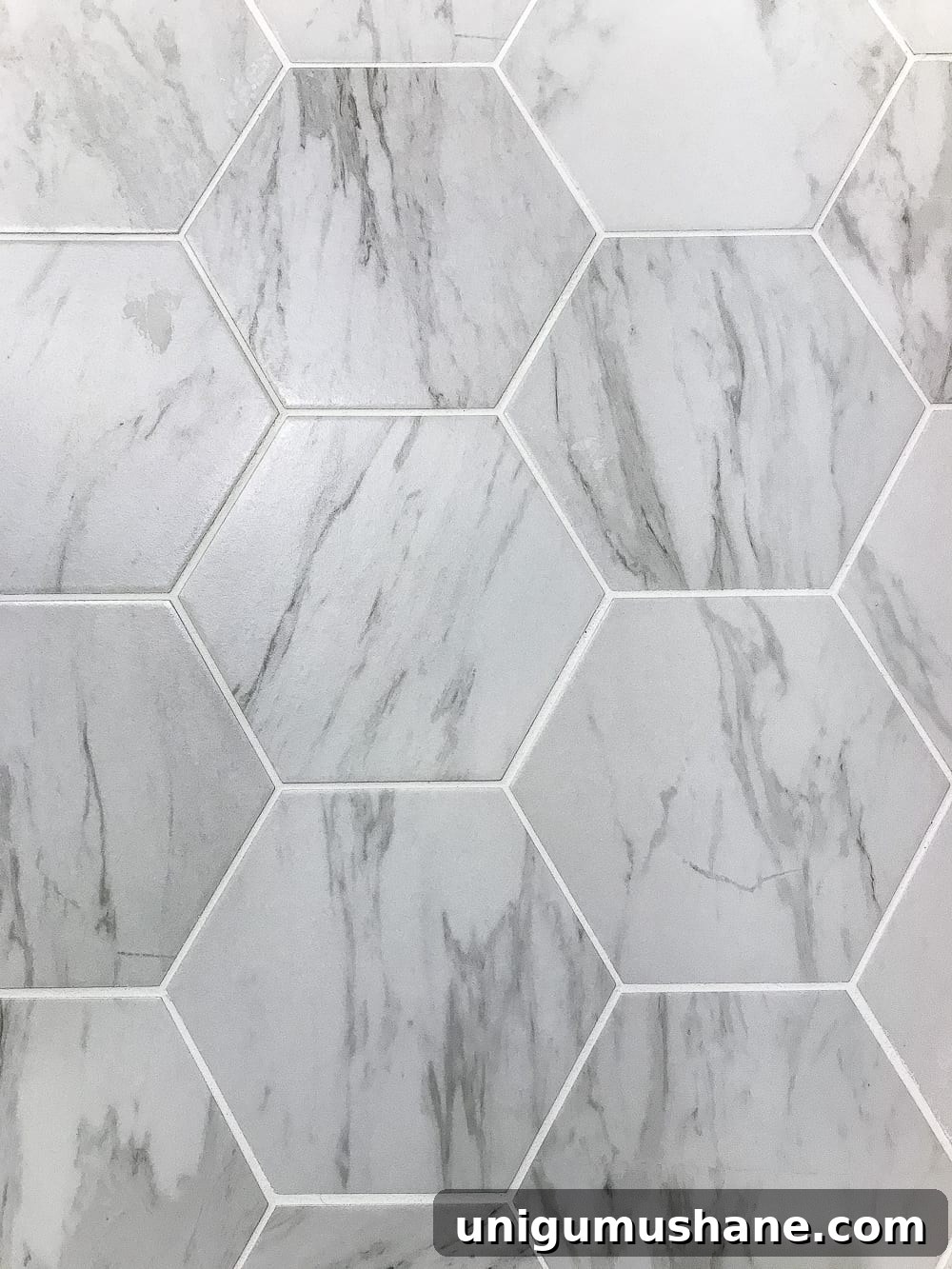 Transform Your Powder Room with Faux Marble Tile Flooring 8 The Best Faux Marble Tile | blesserhouse.com - A dated powder room floor gets a modern classic refresh with faux marble tile & why hiring a contractor is sometimes cheaper than DIY.