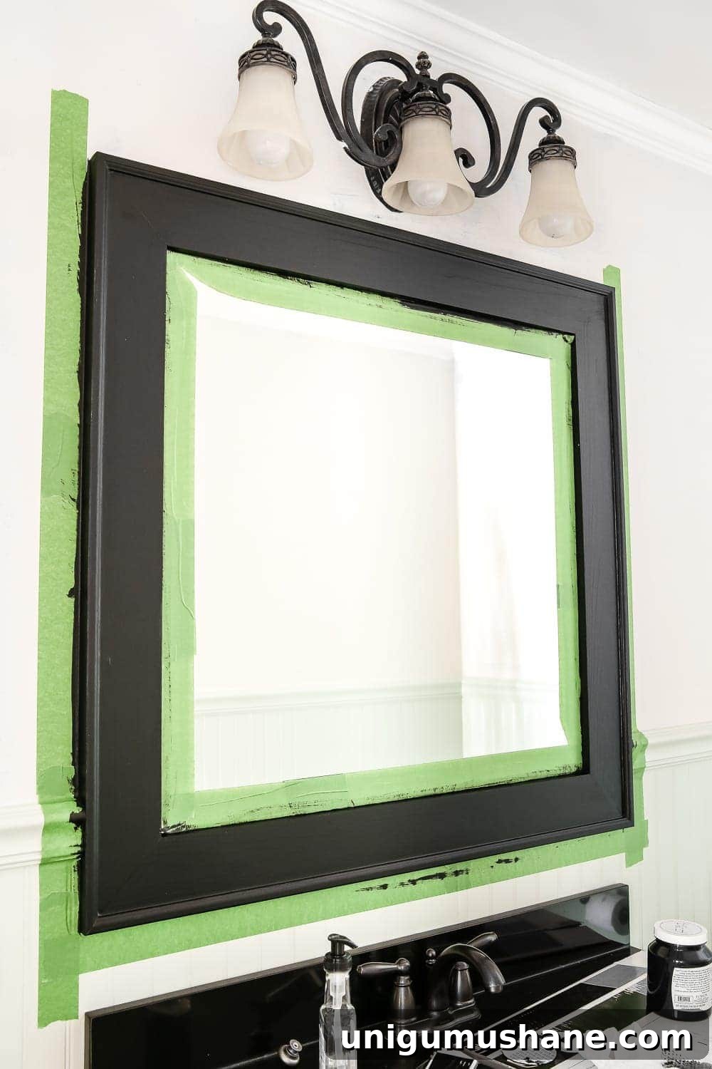 Dry Brushed Black Mirror: DIY Frame Makeover Guide 4 Dry Brushed Black Mirror Makeover | blesserhouse.com - A plain, white painted bathroom mirror gets a high-drama weathered makeover with black paint and dry brushing. (Tutorial)