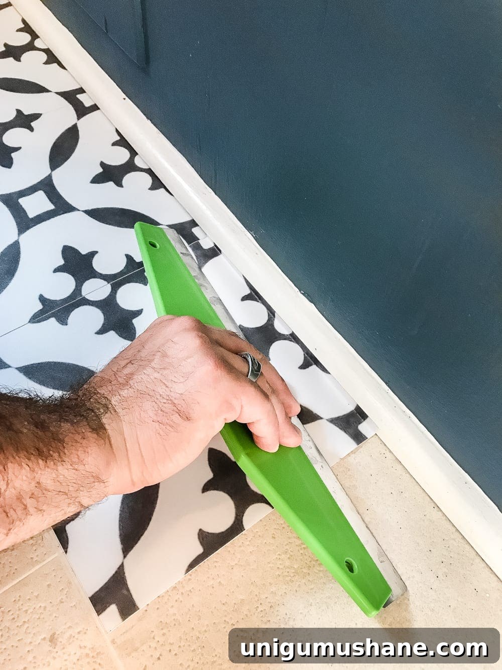 DIY Moroccan Vinyl Tile Flooring Makeover 5 Starting the installation of Moroccan peel and stick vinyl floor tiles