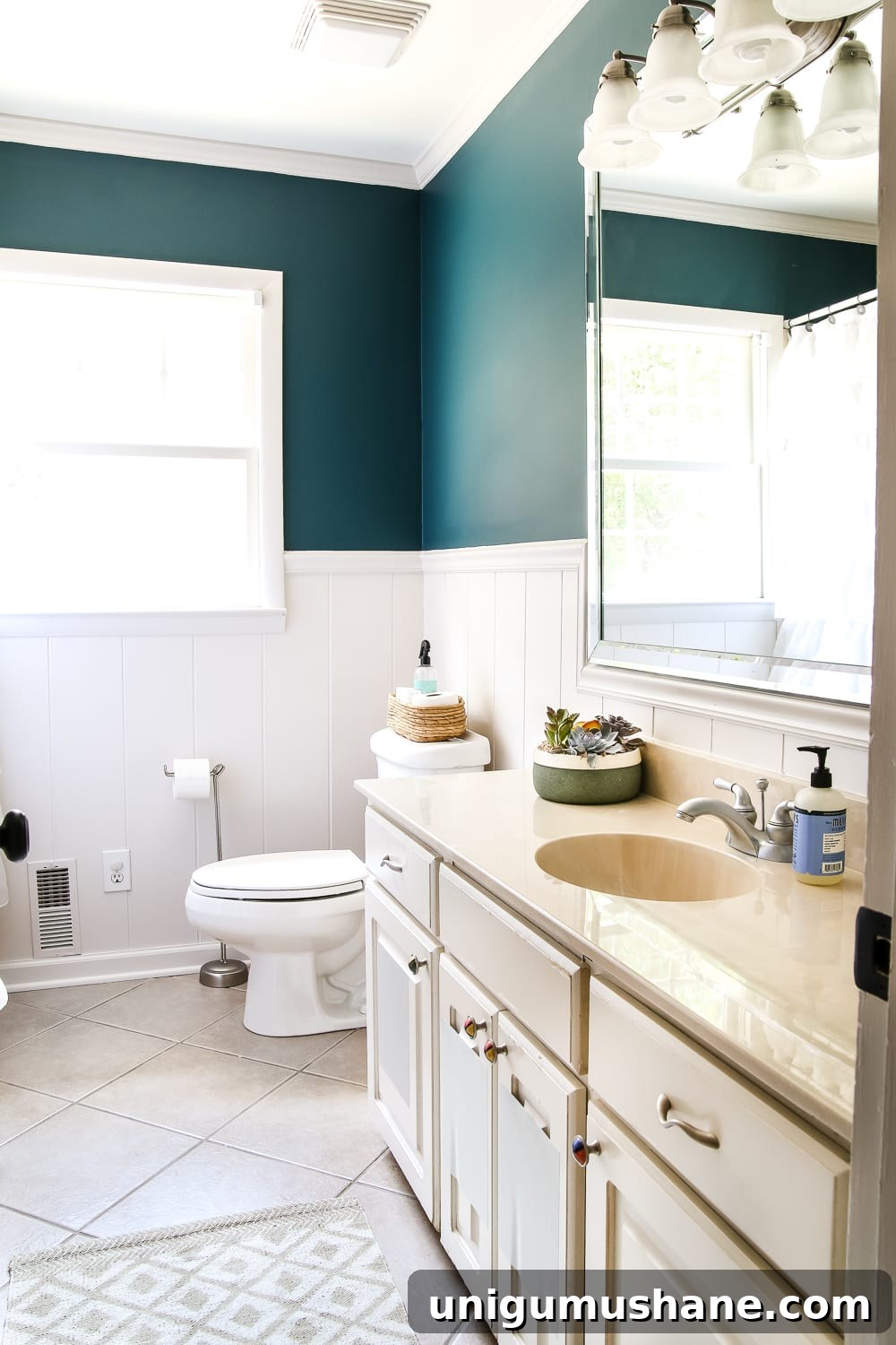 Teal Bathroom Makeover: Paint Ideas, Before and After 3 Teal Painted Bathroom Makeover | blesserhouse.com - A boring, dated beige bathroom gets a fresh teal painted makeover with Magnolia Home Paint in the color Weekend and Ben Moore Simply White and Wrought Iron.