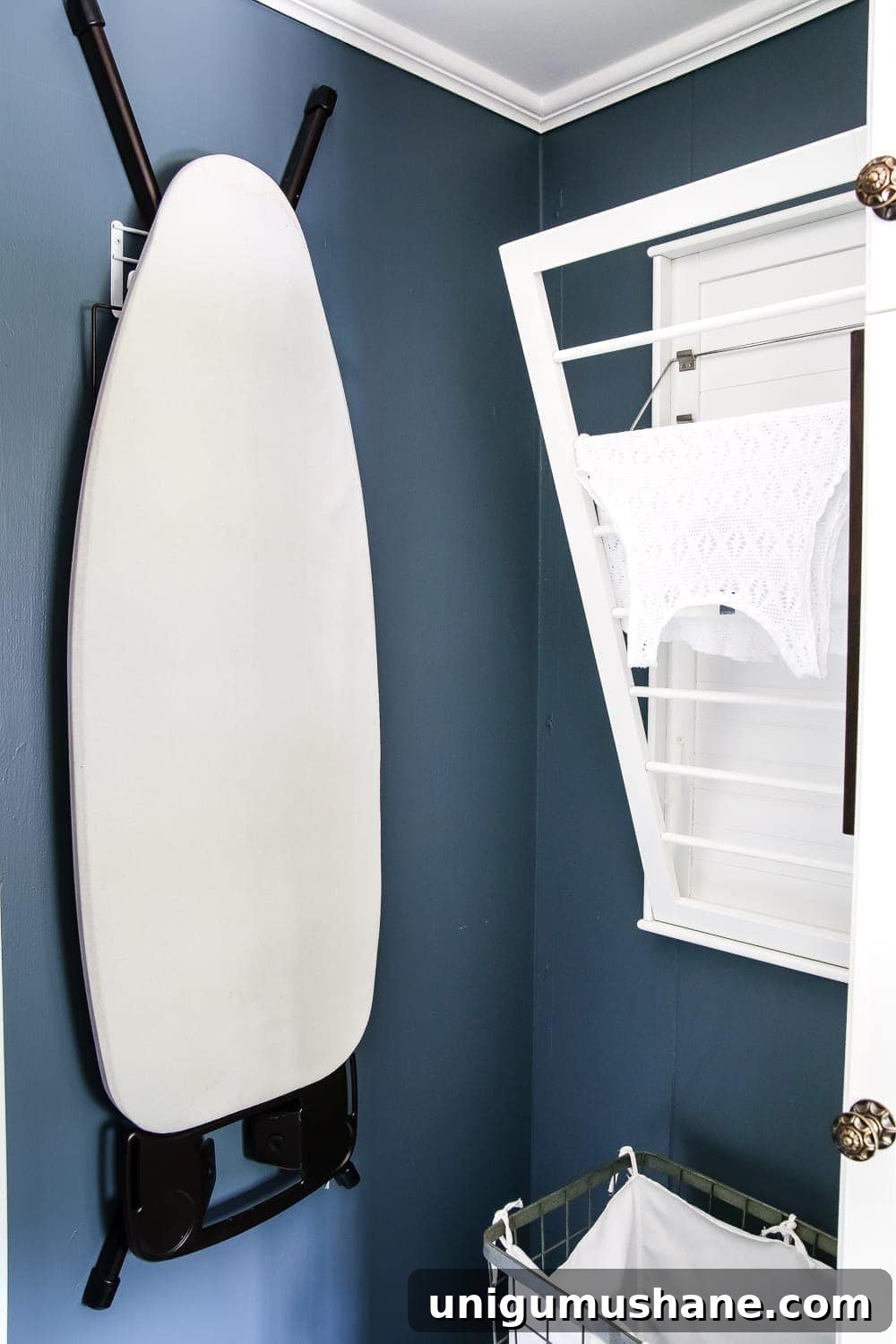 High-Contrast Laundry Room Makeover Before and After 8 High Contrast Laundry Room Makeover | blesserhouse.com - A dingy and dated laundry room gets a high contrast navy and white makeover packed with organizational strategies and budget-conscious DIY projects.