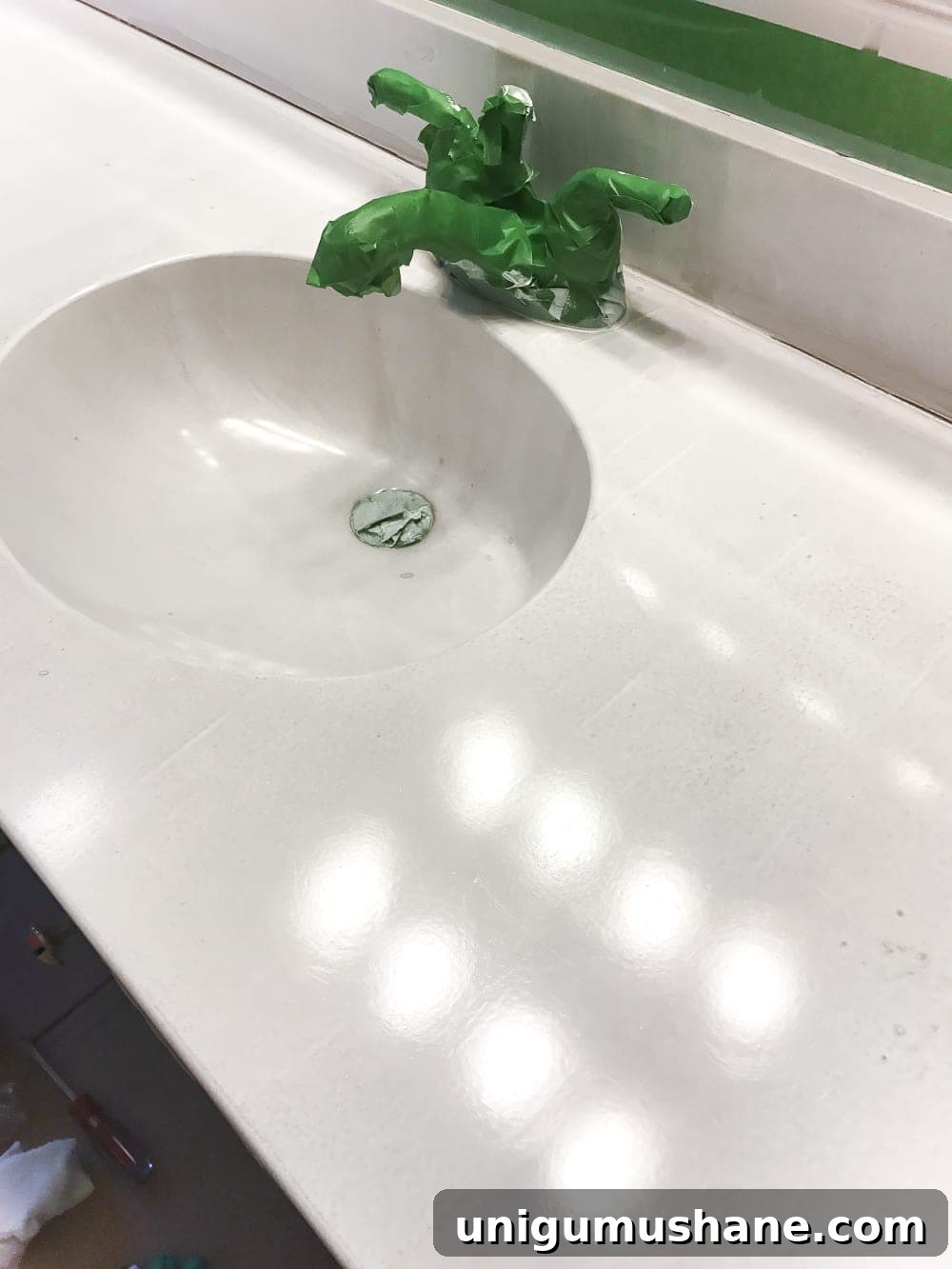 How to Paint a Bathroom Sink Countertop 14 first coat of sink paint