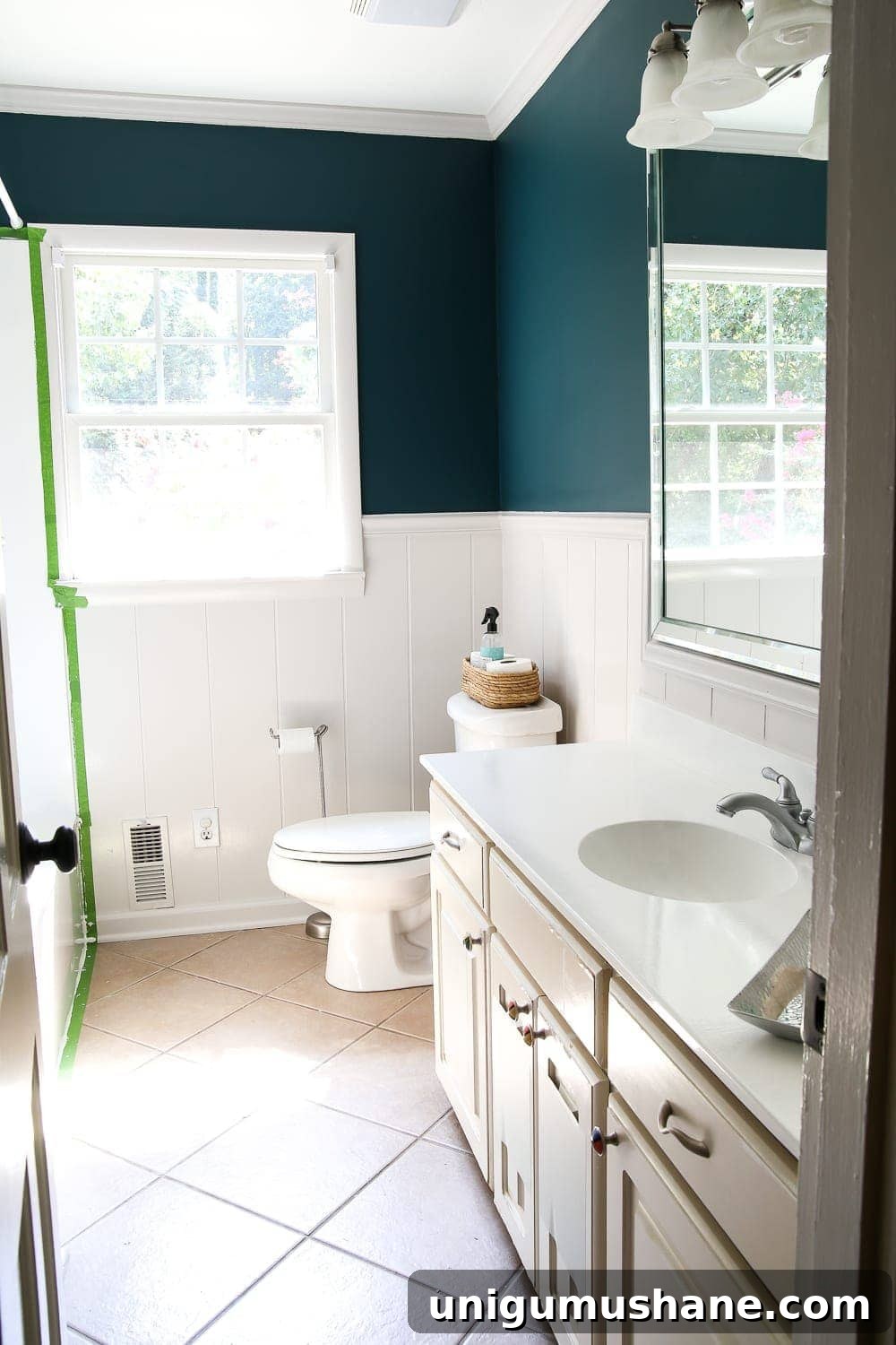 How to Paint a Bathroom Sink Countertop 21 the newly painted bathroom sink countertop in white