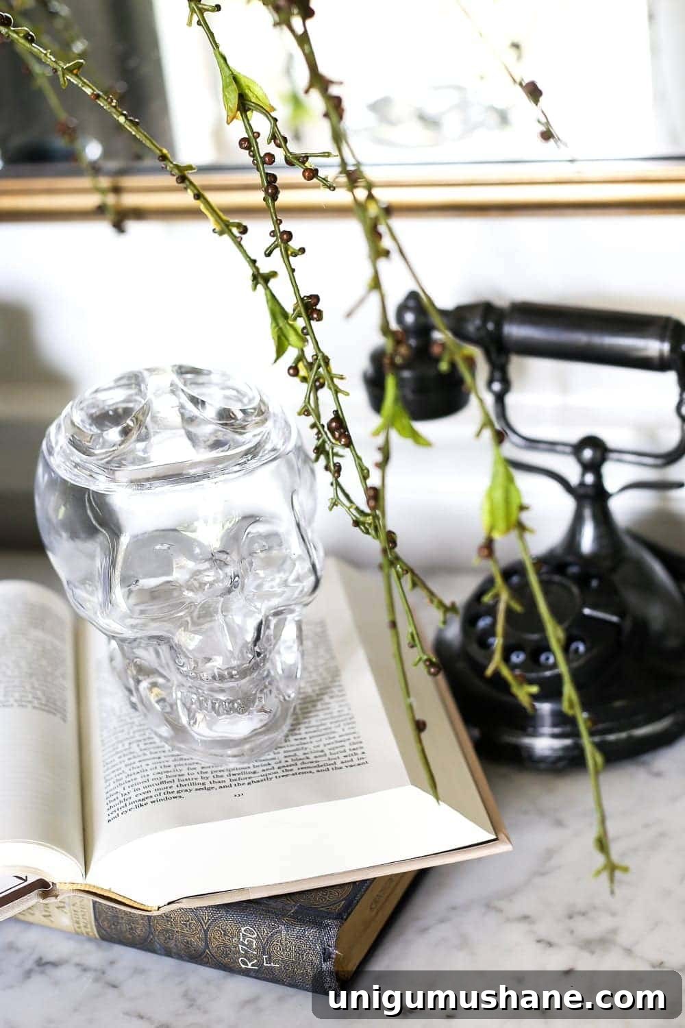 Create DIY Marbled Vases for Your Halloween Entryway 10 DIY Marbled Vases and Halloween Entryway | blesserhouse.com - A quick tutorial for how to turn old jars and bottles into marbled vases (using nail polish) on the cheap that are modern works of art.