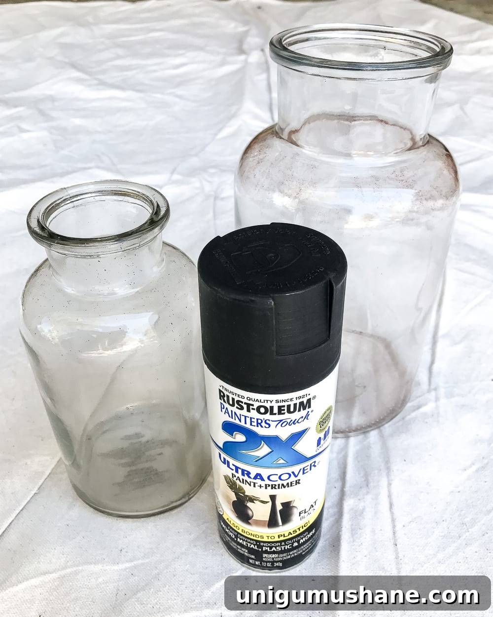 Create DIY Marbled Vases for Your Halloween Entryway 3 DIY Marbled Vases and Halloween Entryway | blesserhouse.com - A quick tutorial for how to turn old jars and bottles into marbled vases (using nail polish) on the cheap that are modern works of art.