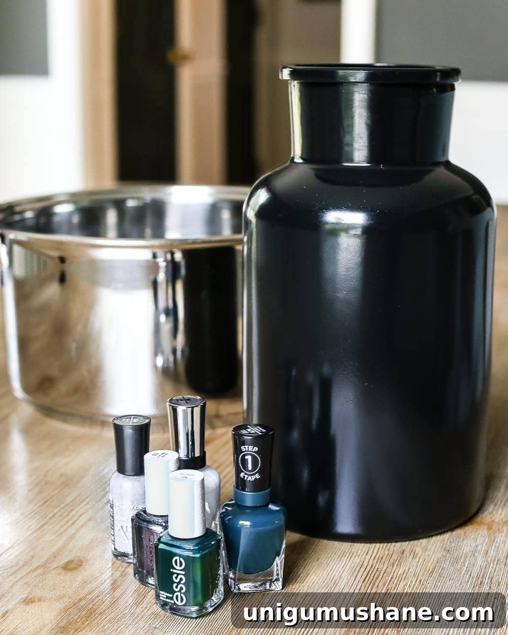 Create DIY Marbled Vases for Your Halloween Entryway 4 DIY Marbled Vases and Halloween Entryway | blesserhouse.com - A quick tutorial for how to turn old jars and bottles into marbled vases (using nail polish) on the cheap that are modern works of art.