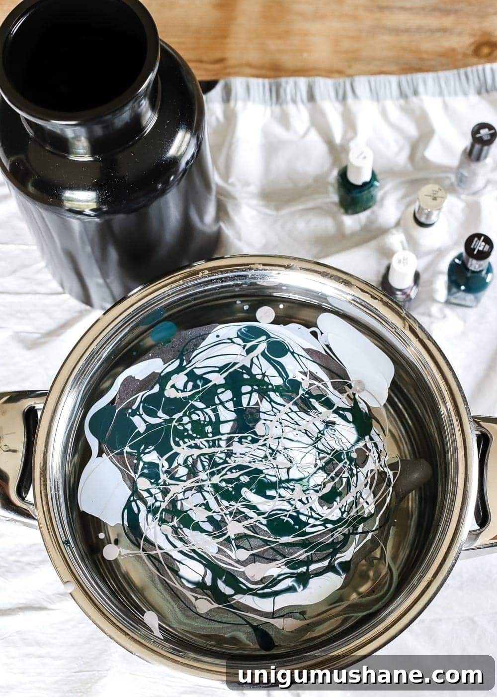 Create DIY Marbled Vases for Your Halloween Entryway 6 DIY Marbled Vases and Halloween Entryway | blesserhouse.com - A quick tutorial for how to turn old jars and bottles into marbled vases (using nail polish) on the cheap that are modern works of art.