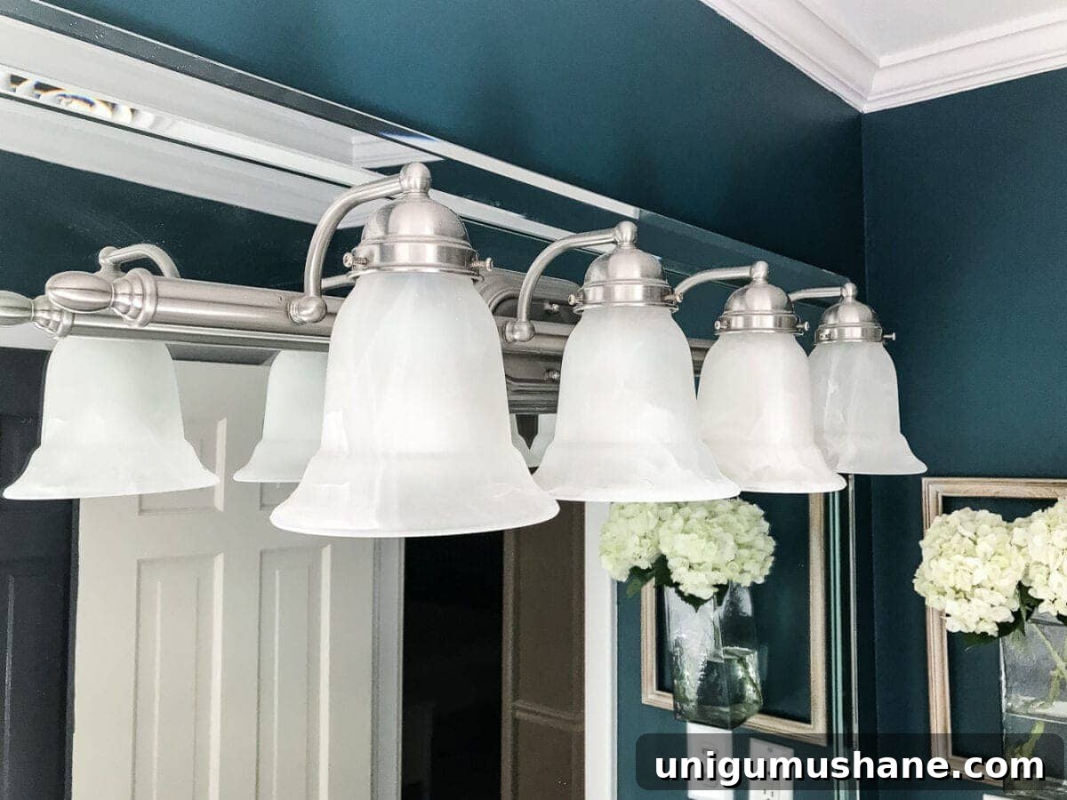 How to Refresh a Light Fixture in 30 Minutes 2 The Easiest Way to Refresh a Light Fixture | blesserhouse.com - One simple way to refresh a bathroom vanity light fixture inexpensively and in under 5 minutes without any electrical work. #lightfixture #simplediy