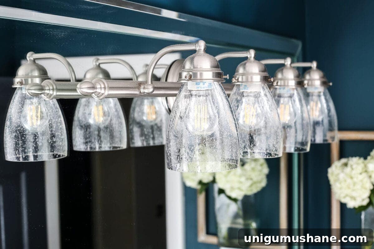 How to Refresh a Light Fixture in 30 Minutes 5 The Easiest Way to Refresh a Light Fixture | blesserhouse.com - One simple way to refresh a bathroom vanity light fixture inexpensively and in under 5 minutes without any electrical work. #lightfixture #simplediy