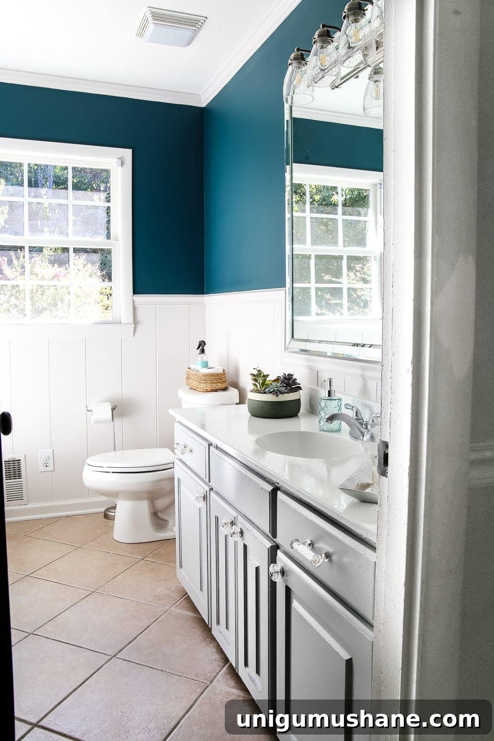Painted Bathroom Cabinets Makeover: Before and After Reveal 3 Painted Cabinet Bathroom Update | blesserhouse.com - A dated cabinet gets a refresh with Benjamin Moore Coventry Gray for an inexpensive bathroom update. #cabinetpainting #homeimprovement #bathroom